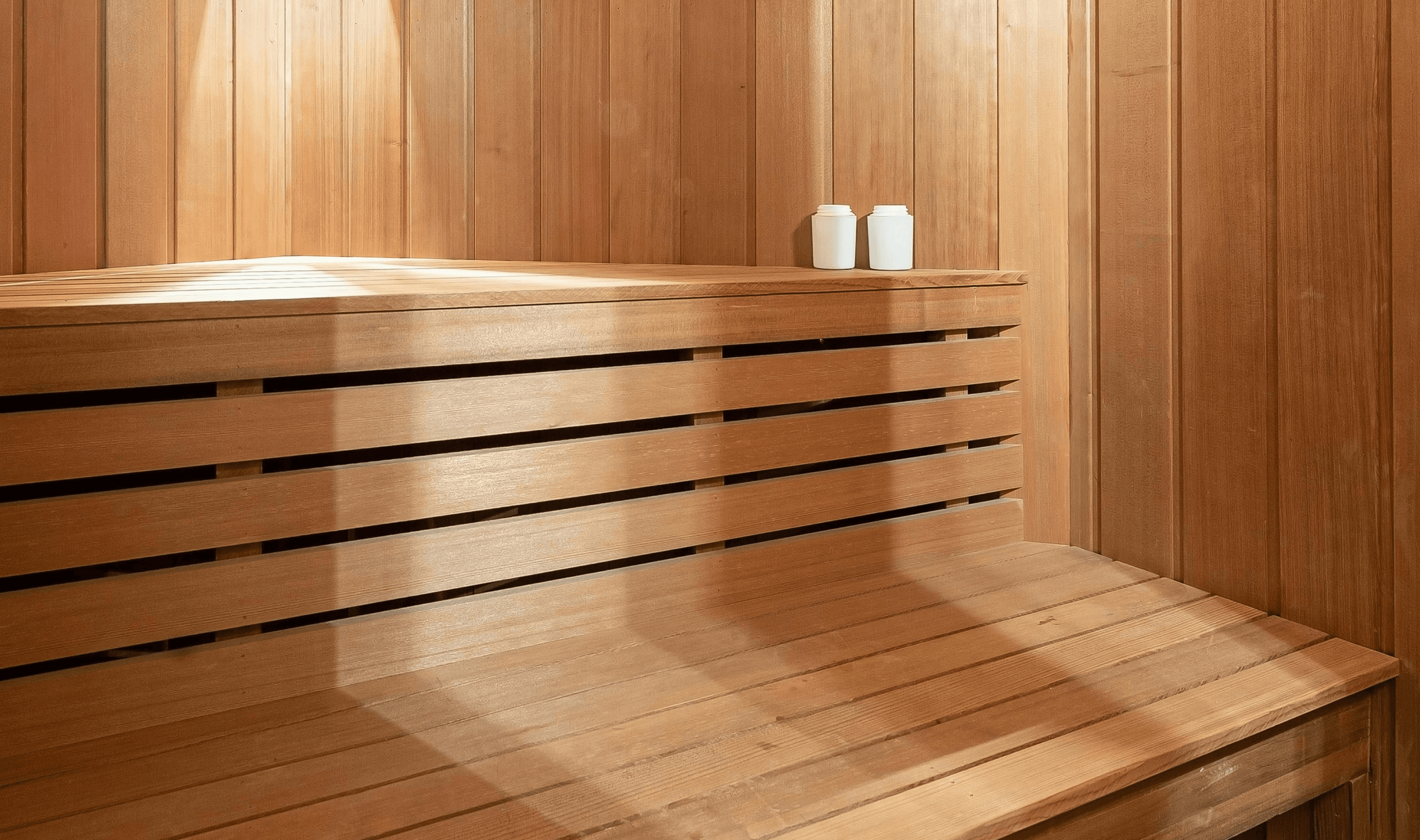 Close-up photo of tree rings and wooden surfaces, highlighting natural patterns and textures.